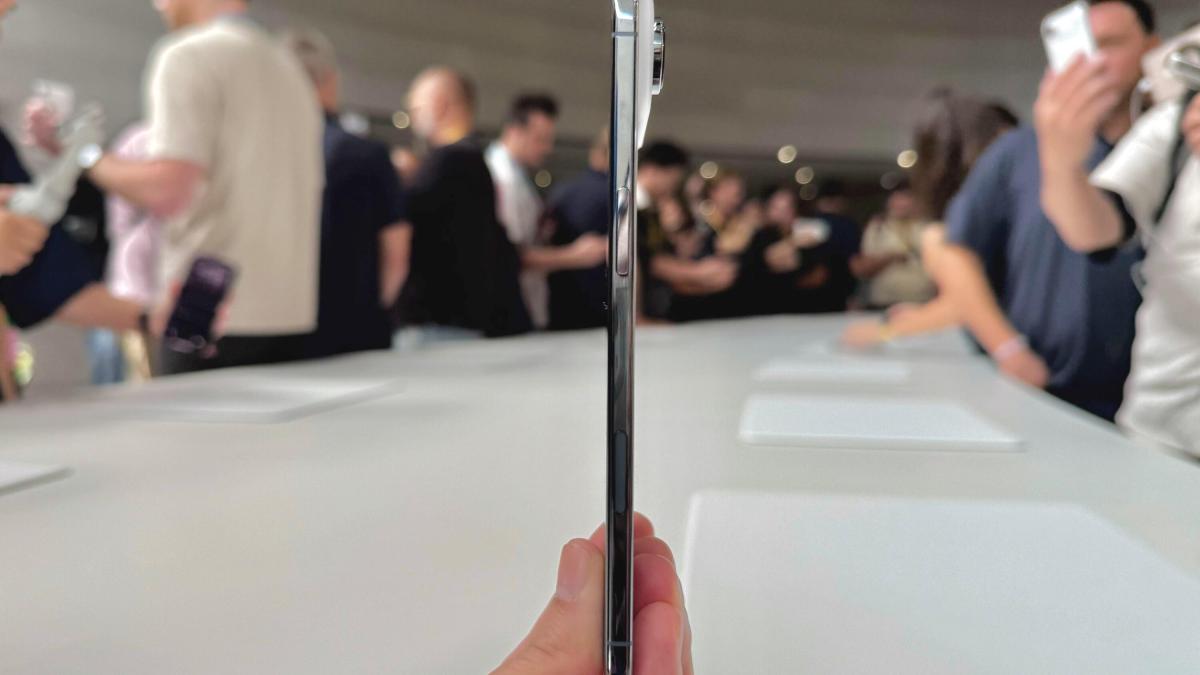 A side shot of the iPhone Air, noting its signature thinness compared to the enlarged camera bump.